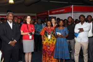 Cross section of officials and participants at the fair.